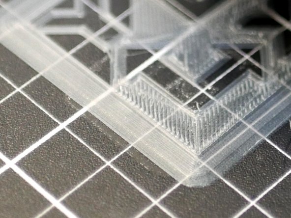 Check your first layer. It should look similar to this. (This may be a little too close, but closer is better than too far away).