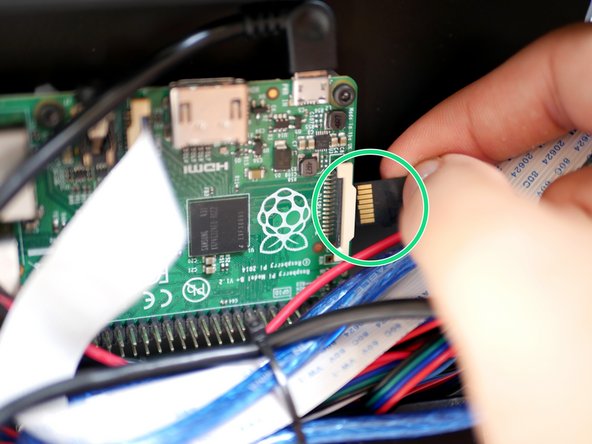 Insert the Micro SD card into the Raspberry Pi.