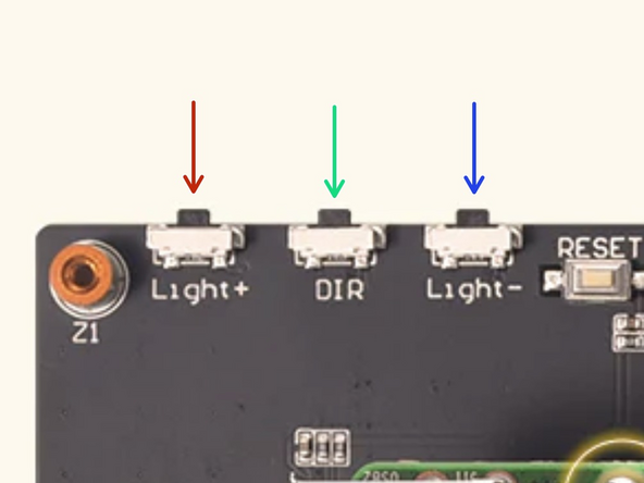 The display has three buttons: