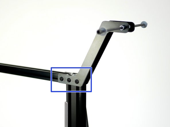 Fix the second spool holder onto the frame.