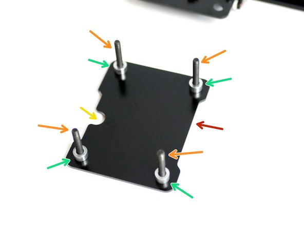 Prepare the Z-axis support bracket with rollers and spacers: