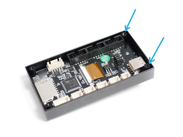 With the left side secured, thread on two M3 x 10 threaded spacers to the remaining two bolts.