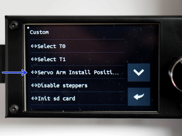 Before installing, make sure that the servo is set to the vertical position. Set this by pressing