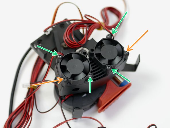 Fix the two 30mm fans onto the heatsink. Orientate the cables as shown.