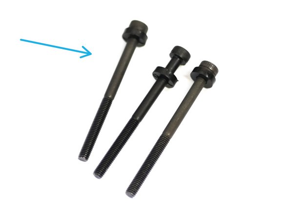 Take these three bolts and remove them from the back of the extruder.