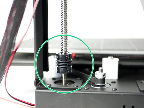Slot the open end of the coupling onto the shaft of the z-motor.
