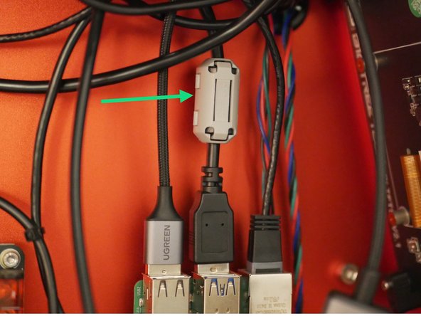 There are three (black) ferrite sleeves included: two large, one medium, and one small. Take the medium-sized ferrite sleeve and clamp it around the Eddy probe’s USB cable.