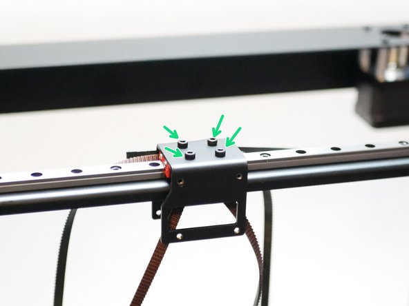 Mount the tool carriage to the gantry as shown. Note the belt claps are facing the rear of the printer, towards the motors.