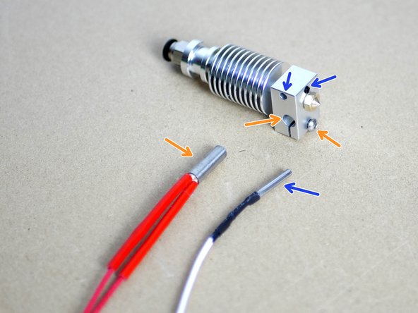 Slide the thermistor into the heater block from the left side and tighten down the set screw to hold it in place.