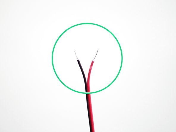 Strip both ends of the black and red power cable.