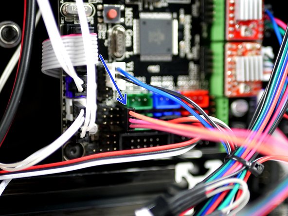 Connect the servo cable to the electronics board like shown.