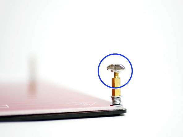 Screw onto the ends of the four brass standoffs an M3 T-Nut.