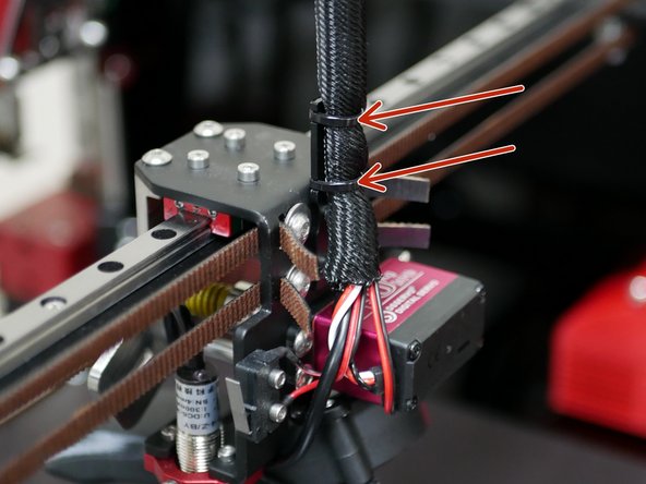 Use cable ties to fix the cable loom to the bracket.