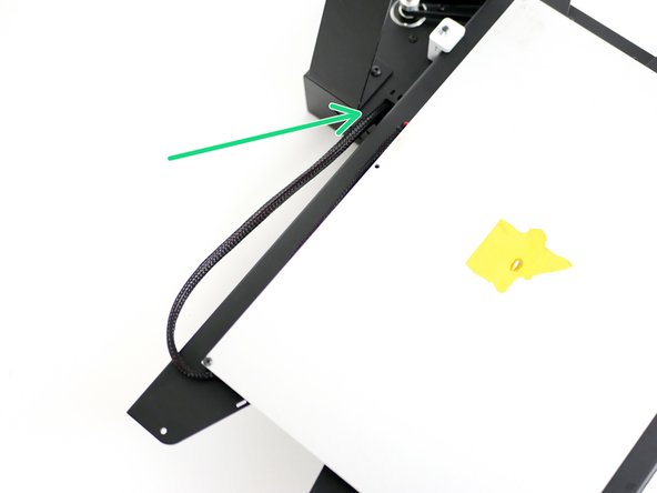 Feed the cables through the base.