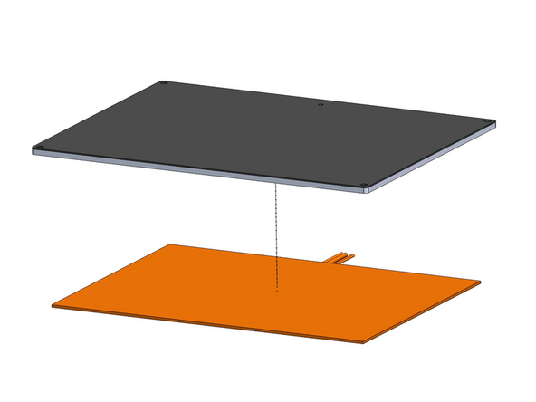 Peel the backing paper away from the heater pad.