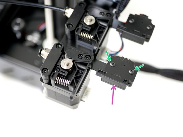 Fix the filament sensor to the Extruder Mounting Bracket: