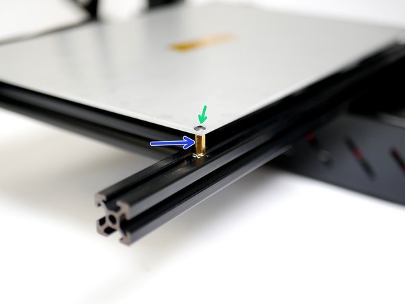 The aluminium heated bed is mounted directly onto the platform frame.