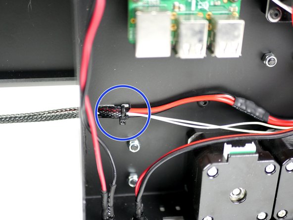 Use cable ties to fix the cable in place.