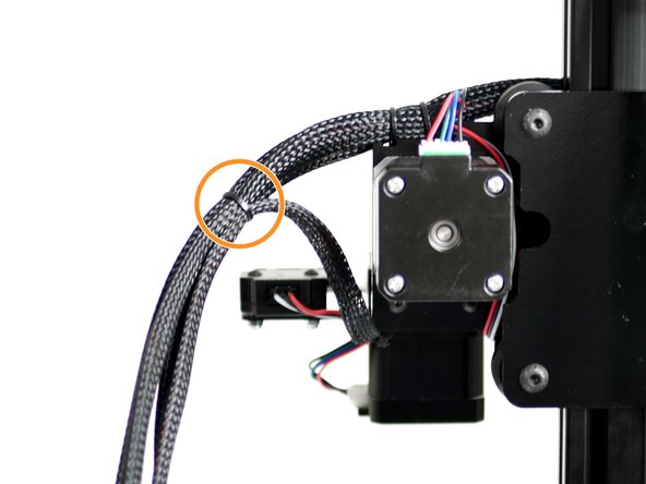 Use a second cable tie to connect the cables from the gantry to the extruder's cables.