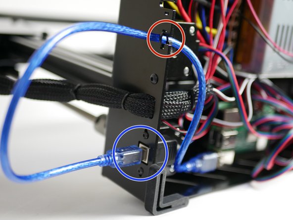 Connect the other end of the cable to the port on the back of the printer.