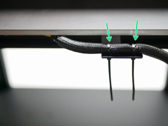 Use cable ties to secure the sleeving to the cable relief bracket.