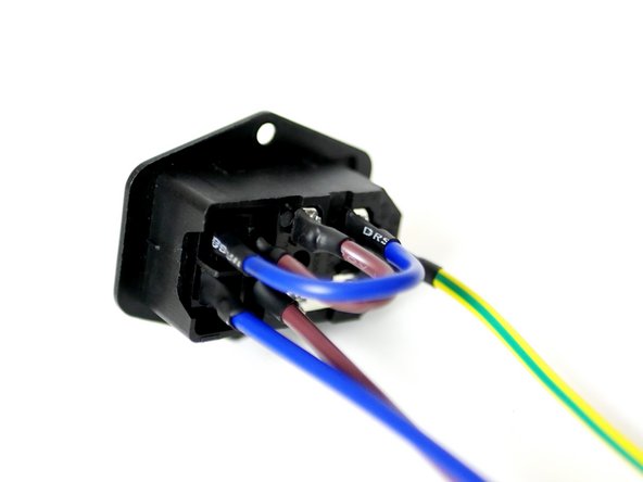 Check that the IEC Switch cables are all properly connected and insulated as shown in the image.