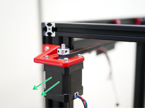 Pull the motors back to tension the belt further.