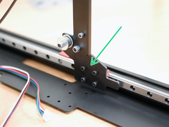 Fix the gantry to the Y-rail carriages using the original M3 x 6mm bolts.