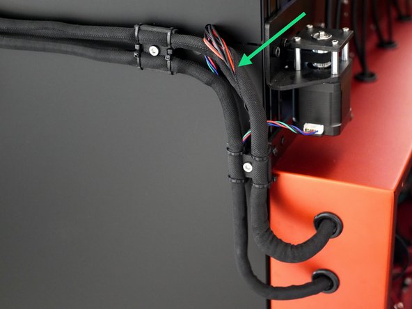 Route the cable through the groove in the extrusion using a length of cable cover to hold in place.