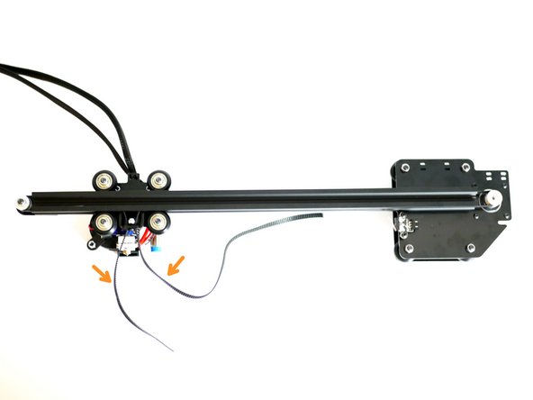 Pull the loose ends of the belt tight.