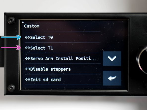 Pressing T0 will select the left hotend.