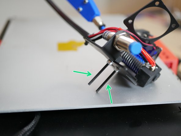 Replace the M3 x 25mm bolts on the metal tool carriage with the two M3 x 35mm bolts.