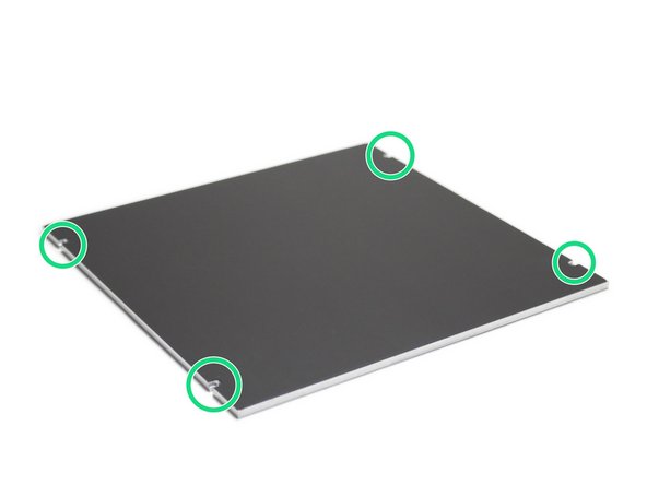 Use a knife to remove the excess magnetic sheet from the platforms mounting slots.