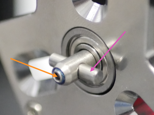 Install the cam pin with the grub screw pressing onto the flat face of the cam pin.