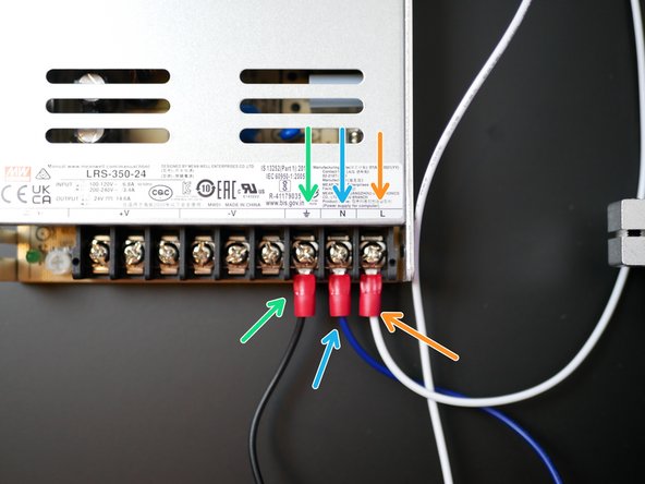Connect the blue cable from the socket to the neutral terminal on the power supply.