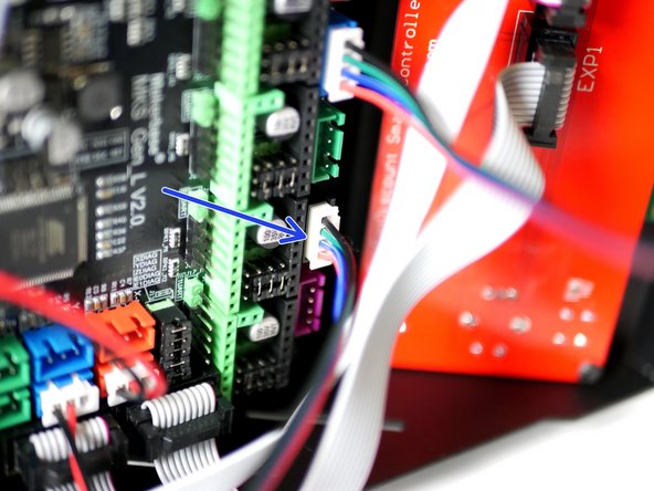 Plug the extruder motor cable into the control board like shown.