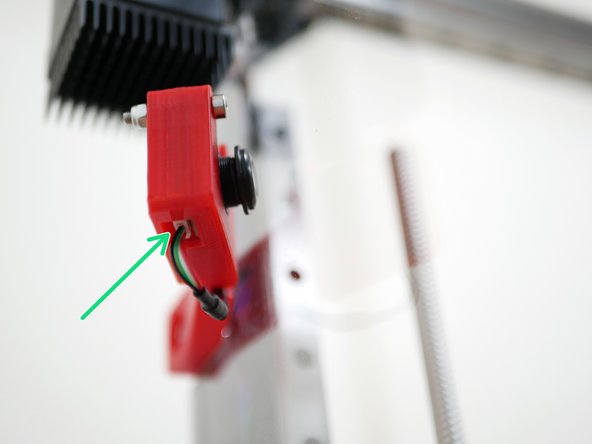 Feed the camera cable through the base first (the USB side is too big to fit).