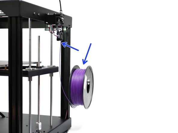 Use scissors or side cutters to create a sharp point and feed it into the extruders.