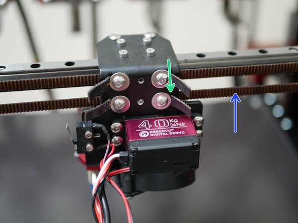 Again, it needs to be fed in from the inside of the bracket - you may need to temporarily remove it from the linear rail carriage to gain better access.