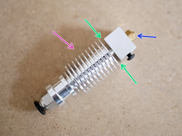 Reassemble the Hotend making sure that there is a gap between the heater-block and heatsink.