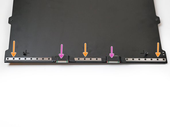 Use a 2mm metal drill to create 3 holes on either side of the platform.