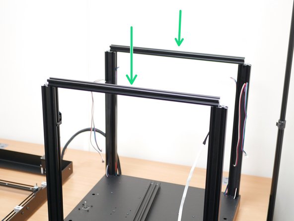 Take the four long 2020 extrusions that you drilled the holes into earlier.