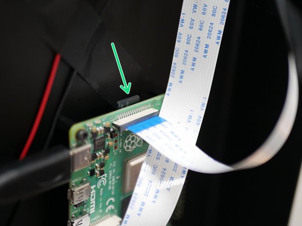 Insert the SD card into the Raspberry Pi and power up your printer.