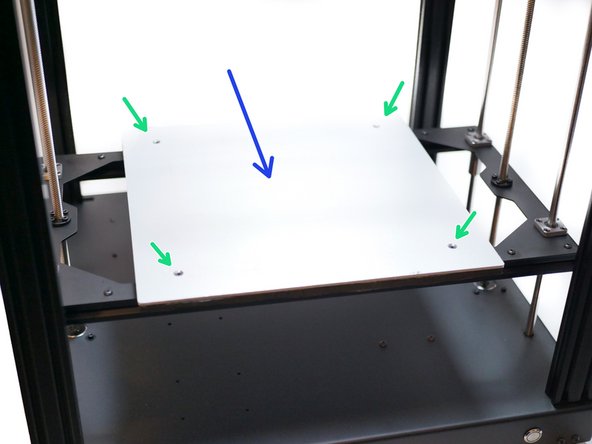 Mount the heated bed onto the stand-offs that were installed in the previous step.
