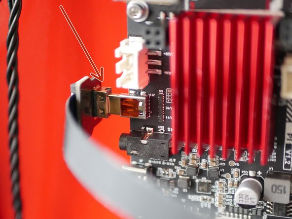 Plug the micro HDMI connector to the port on the side of the BTT Pi.