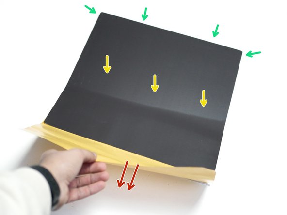 Peel away the backing paper from one edge and align it with an edge on the MIC-6 platform.