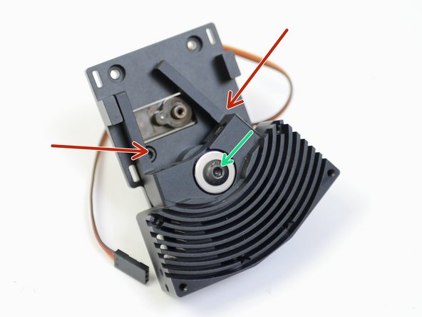 Drop an M5 nut into the back of the Backplate.