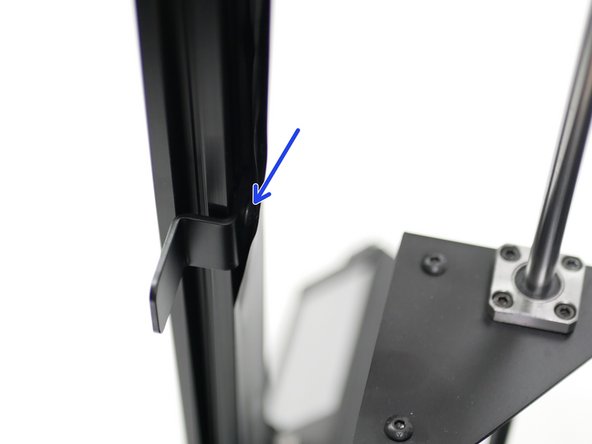 Align the enclosure latch with the magnet on the door handle and fix it in place on the inside of the frame.