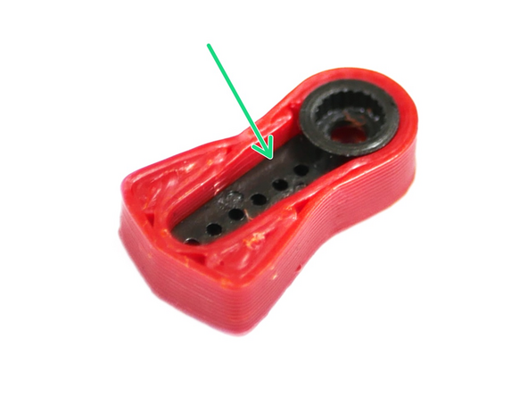 The 3D printed part of the arm can be found here, we recommend printing it in ABS.