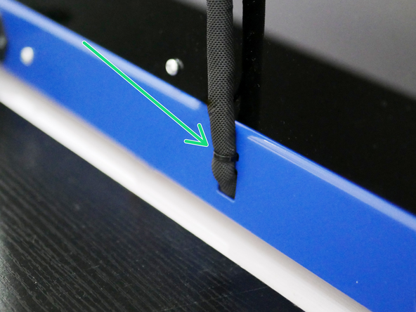 Lay the printer front side down to gain access the the electronics underneath.